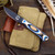 Custom Small Game -  Magnacut - Black Cerakote - Black / White / Blue Gwood Handle
