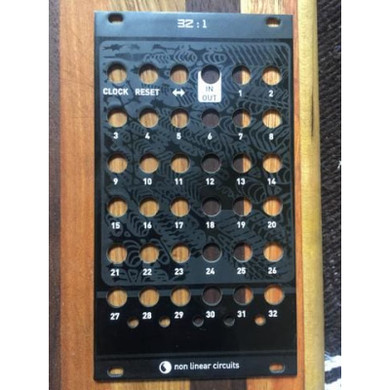 32 to 1 or 1 to 32 multiplexor, or 32 stage counter, with clock in, reset and up/down controls.