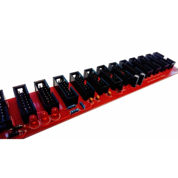 PCB board with multiple power headers for Eurorack case distribution.