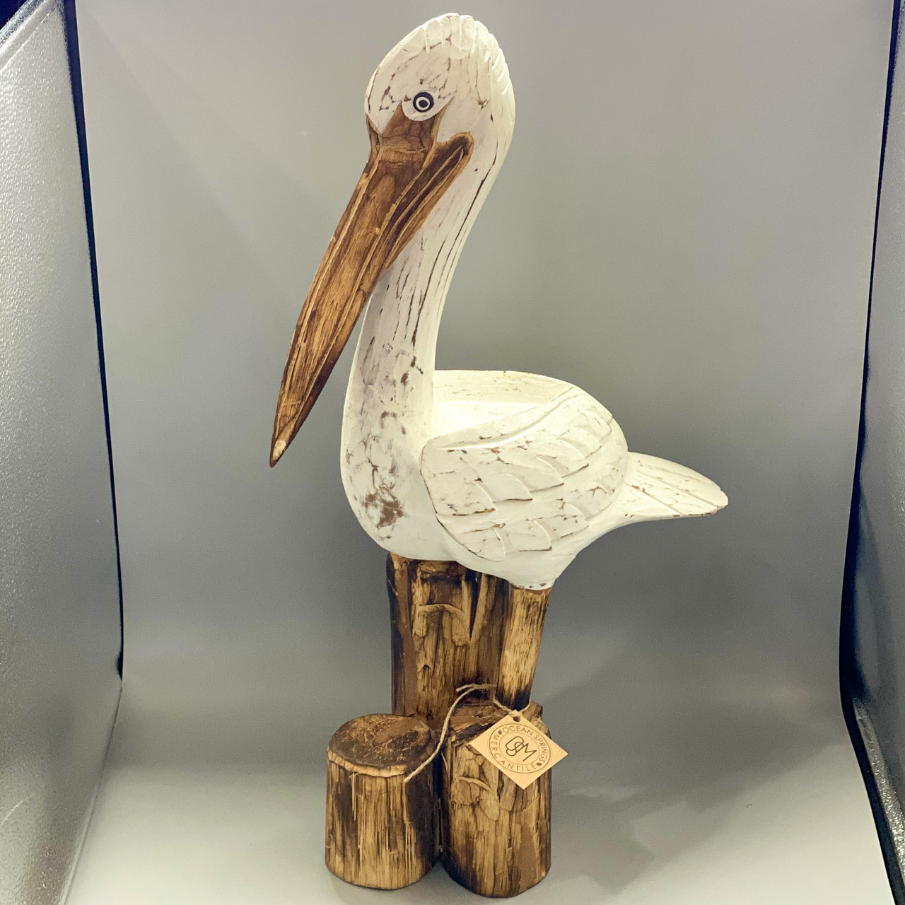 25" Wooden Pelican on Triple Post Ocean Springs Mercantile