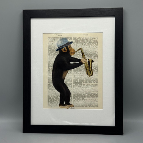 Monkey Playing Saxophone Framed Book Print