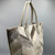 Grey Hair on Leather Handbag
