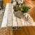 This Iron & Antique Wood Table is a one-of-a-kind piece of Ocean Springs History. The planks of wood are from the Newcomb Clark house that was built in 1904 in Ocean Springs, on Porter Ave.