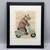Rhino on Scooter Framed Book Print