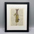 Rabbit in Mustard Dress Framed Book Print