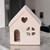 17CM CREAM CERAMIC HOUSE TEALIGHT HOLDER
