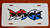 Red, White & Blue Dodge Hash mark sticker on White license plate