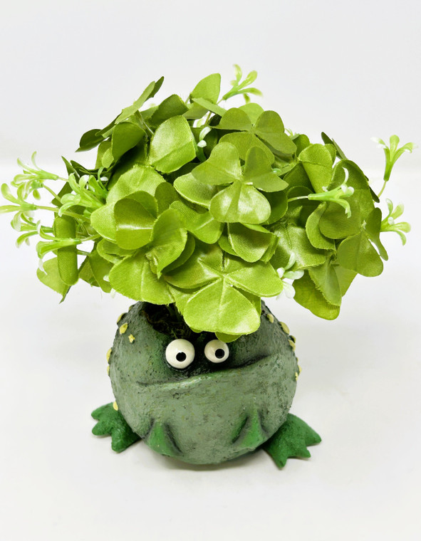 frog pot with silk clover plant