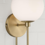 Capital 1-Light Circular Globe Sconce in Aged Brass 