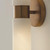 Capital 2-Light Cylindrical Linear Bath Bar Sconce in Aged Brass with Faux Alabaster Glass 