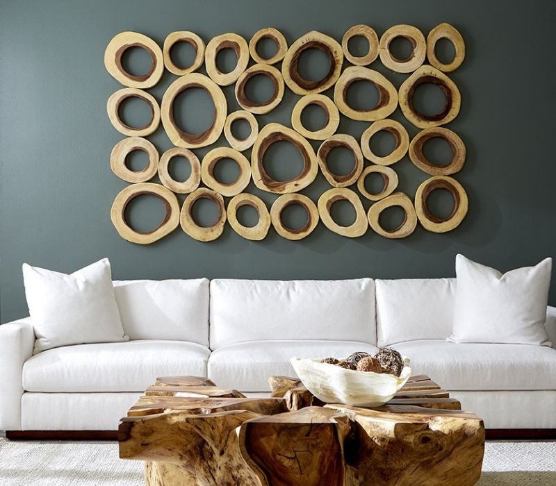 Chuleta Rings Rectangle Wall Art styled in a cozy living room setting on a wall behind a couch. 