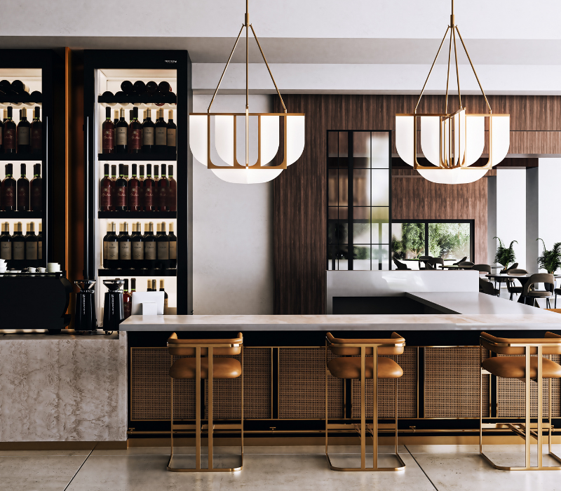 Two Anders Pendants by Alora Lighting styled over a modern bar with three bar stools and two major wine refrigerators.