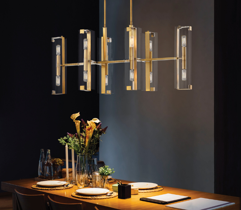 Winfield Linear Chandelier styled over a dining room lifestyle image by Savoy House.