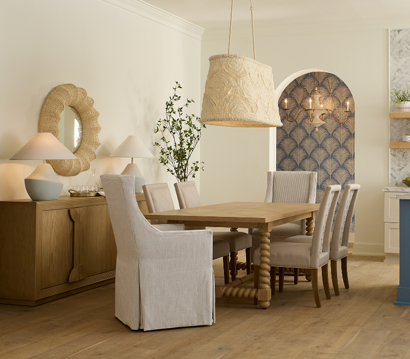 Dining room setting filled with Gabby furniture pieces and decor.
