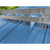 Double bar snow guard installed on exposed fastener metal roof with galvanized brackets and retention bars