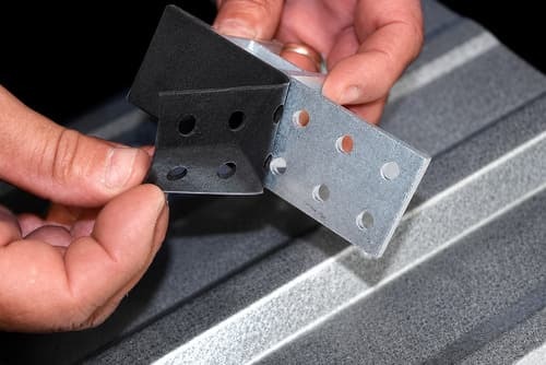 Applying foam gasket to SnoBar ColorBar ColorBracket before installation
