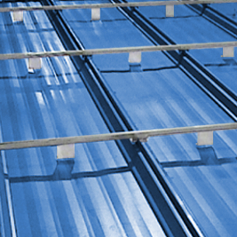 WindBar spacing layout for standing seam metal roof noise and uplift control