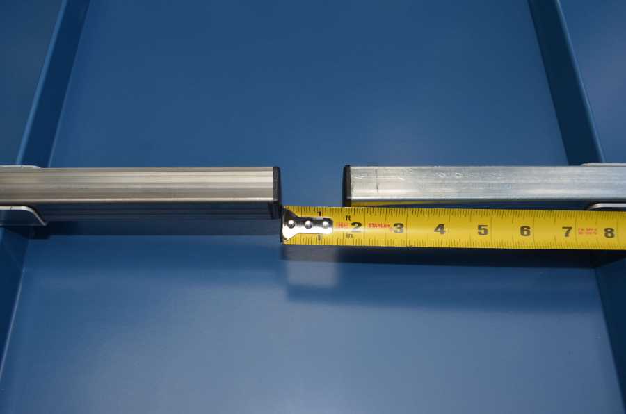 Image showing measuring tape gauging the distance between 2 SnoBar bars