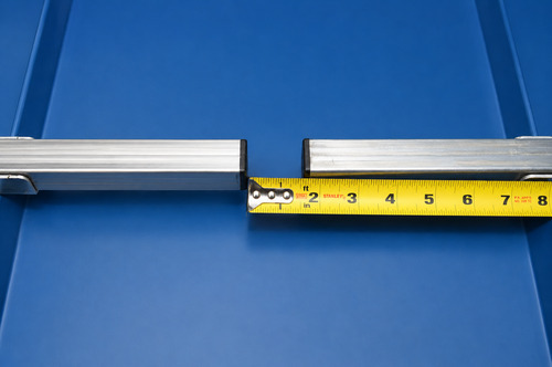SnoBar butt joint centered in panel valley with no more than two inch gap