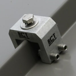 Metal roof clamps for snow retention and solar panel attachment