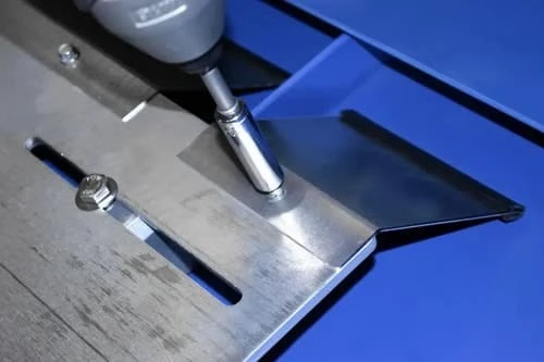 Attaching VentSaver ice ramp to mounting plate