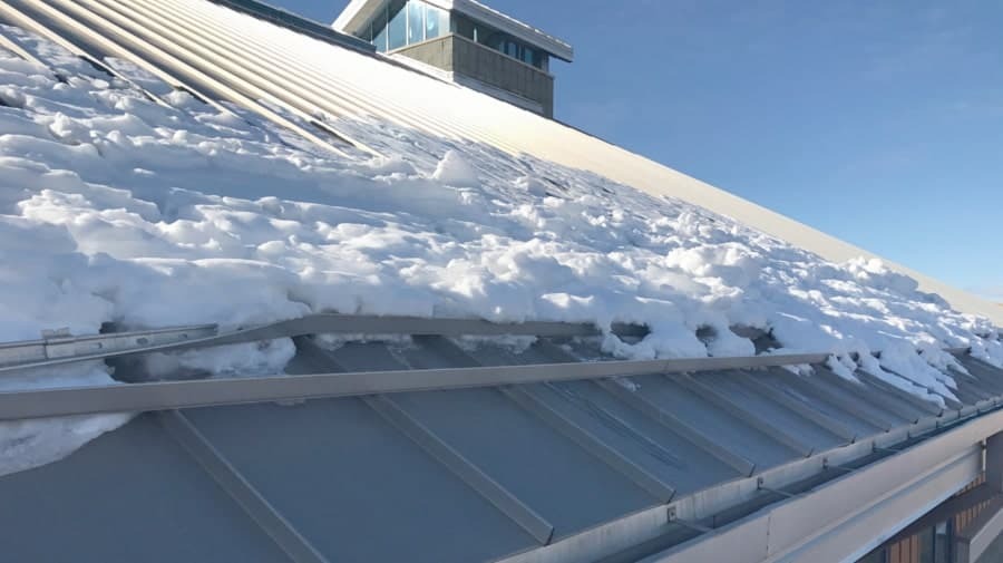 Snow Rails Clustered At Bottom Edge of Roof