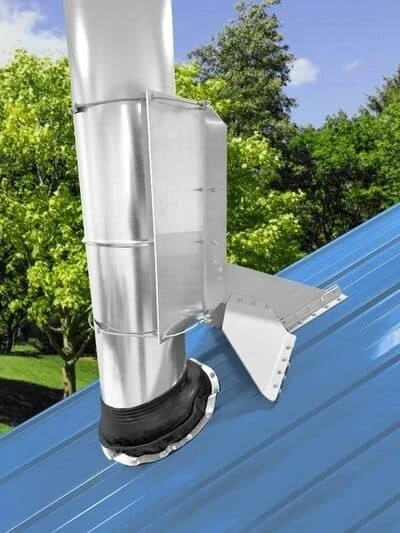 VentSaver Extreme installed behind chimney on metal roof