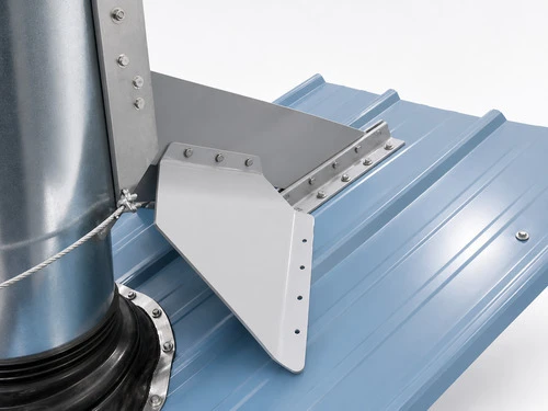 VentSaver Extreme lower wing flange fastened over roof ribs