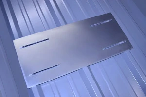 VentSaver screw down mounting plate set on roof panel