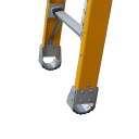 Close-up of the base and feet of an Indalex fibreglass extension ladder.