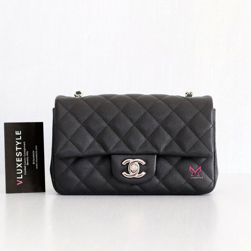 VAN CLEEF 
ARPELS Chanel Classic Mini Rectangular 18B Black Quilted Caviar with silver hardware 