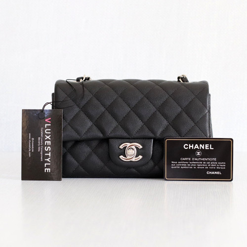 VAN CLEEF 
ARPELS Chanel Classic Mini Rectangular 18B Black Quilted Caviar with silver hardware 