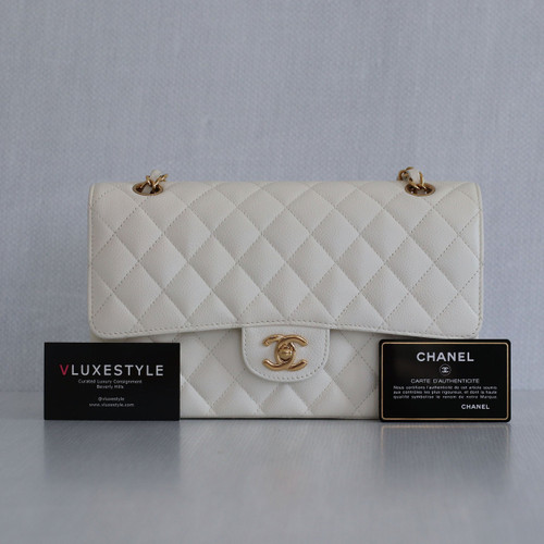 VAN CLEEF 
ARPELS Chanel Vintage Classic Medium Double Flap White Quilted Caviar with 24K gold plated hardware 