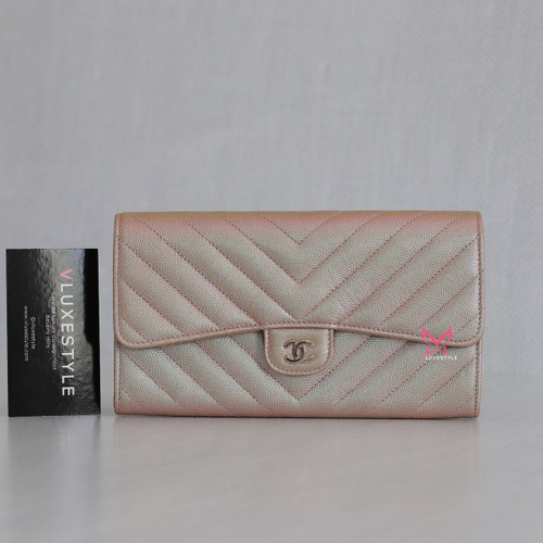 VAN CLEEF 
ARPELS Chanel Classic Long Flap Wallet 17B Rose Gold Chevron Caviar with silver hardware 