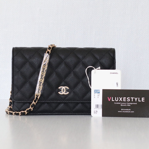 VAN CLEEF 
ARPELS Chanel Wallet on Chain 22P Black Quilted Caviar with light gold hardware 