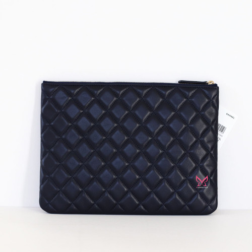 CHANEL Medium O Case 18K Navy Quilted Lambskin Charms 