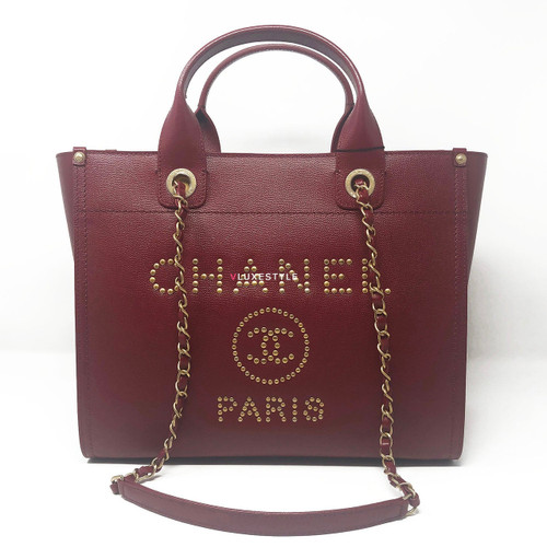 VAN CLEEF 
ARPELS Chanel 18K Studded Burgundy Caviar Leather Deauville 