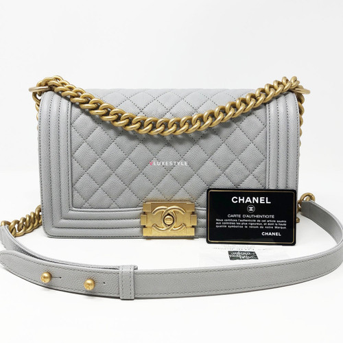 VAN CLEEF 
ARPELS Chanel 18P Le Boy Old Medium Grey Caviar with brushed gold hardware 