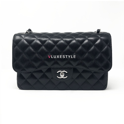 VAN CLEEF 
ARPELS Chanel Classic Black Jumbo Double Flap Caviar with silver hardware 