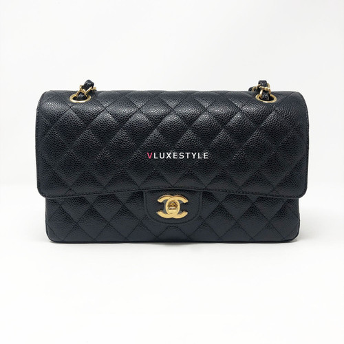 VAN CLEEF 
ARPELS Chanel Classic Black Quilted Caviar Medium Double Flap with gold hardware 