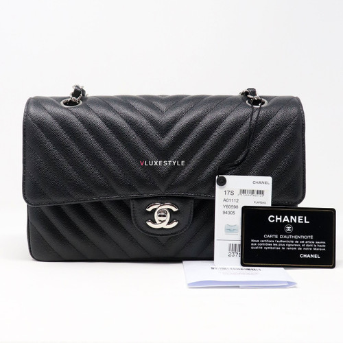 VAN CLEEF 
ARPELS Chanel Classic Medium 17S Black Chevron Caviar with silver hardware 