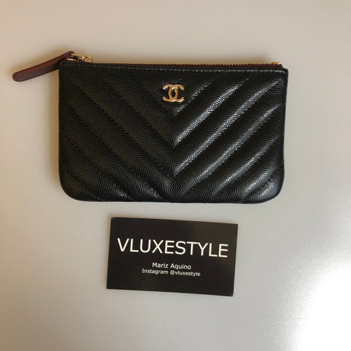 VAN CLEEF 
ARPELS Chanel Mini O Pouch Black Chevron Caviar with gold hardware 