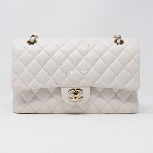 VAN CLEEF 
ARPELS Chanel Classic Medium Double Flap 19B White Quilted Caviar with light gold hardware 