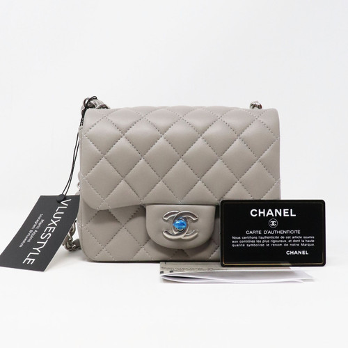 VAN CLEEF 
ARPELS Chanel Classic Mini Square 19B Gray Quilted Lambskin with silver hardware 