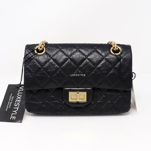 VAN CLEEF 
ARPELS Chanel Mini Reissue 19A Black Aged Quilted Calfskin with shiny gold hardware 