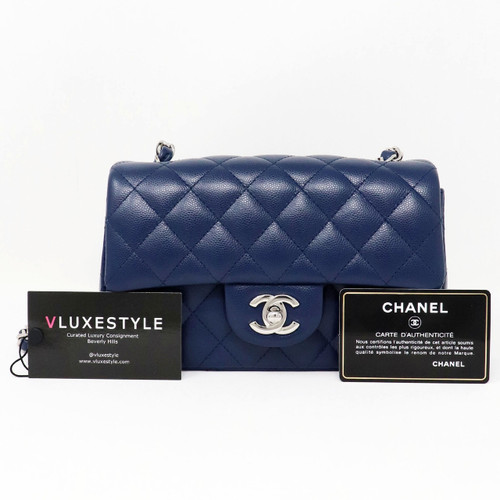 VAN CLEEF 
ARPELS Chanel Classic Mini Rectangular 17B Navy Quilted Caviar with silver hardware 