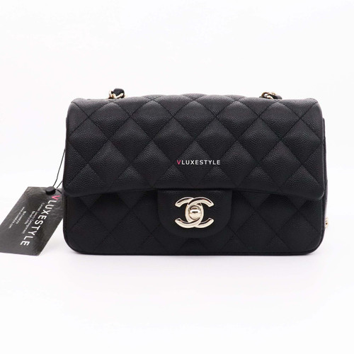 VAN CLEEF 
ARPELS Chanel Classic Mini Rectangular 18B Black Quilted Caviar with light gold hardware 