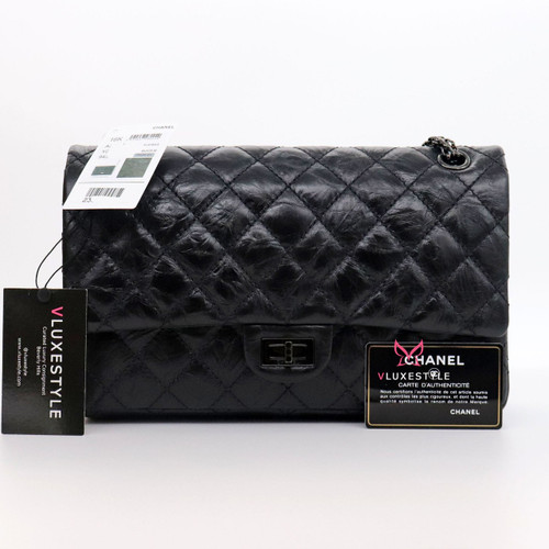 VAN CLEEF 
ARPELS Non-refundable deposit to reserve: Chanel Reissue 226 Double Flap 16K So Black Quilted Calfskin with shiny black hardware 