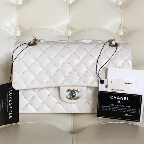 VAN CLEEF 
ARPELS Chanel Classic Medium Double Flap 21C White Quilted Caviar with light gold hardware 