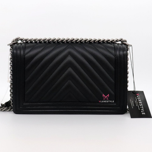 VAN CLEEF 
ARPELS Chanel Le Boy New Medium 18S Black Chevron Caviar with shiny silver/ruthenium hardware 